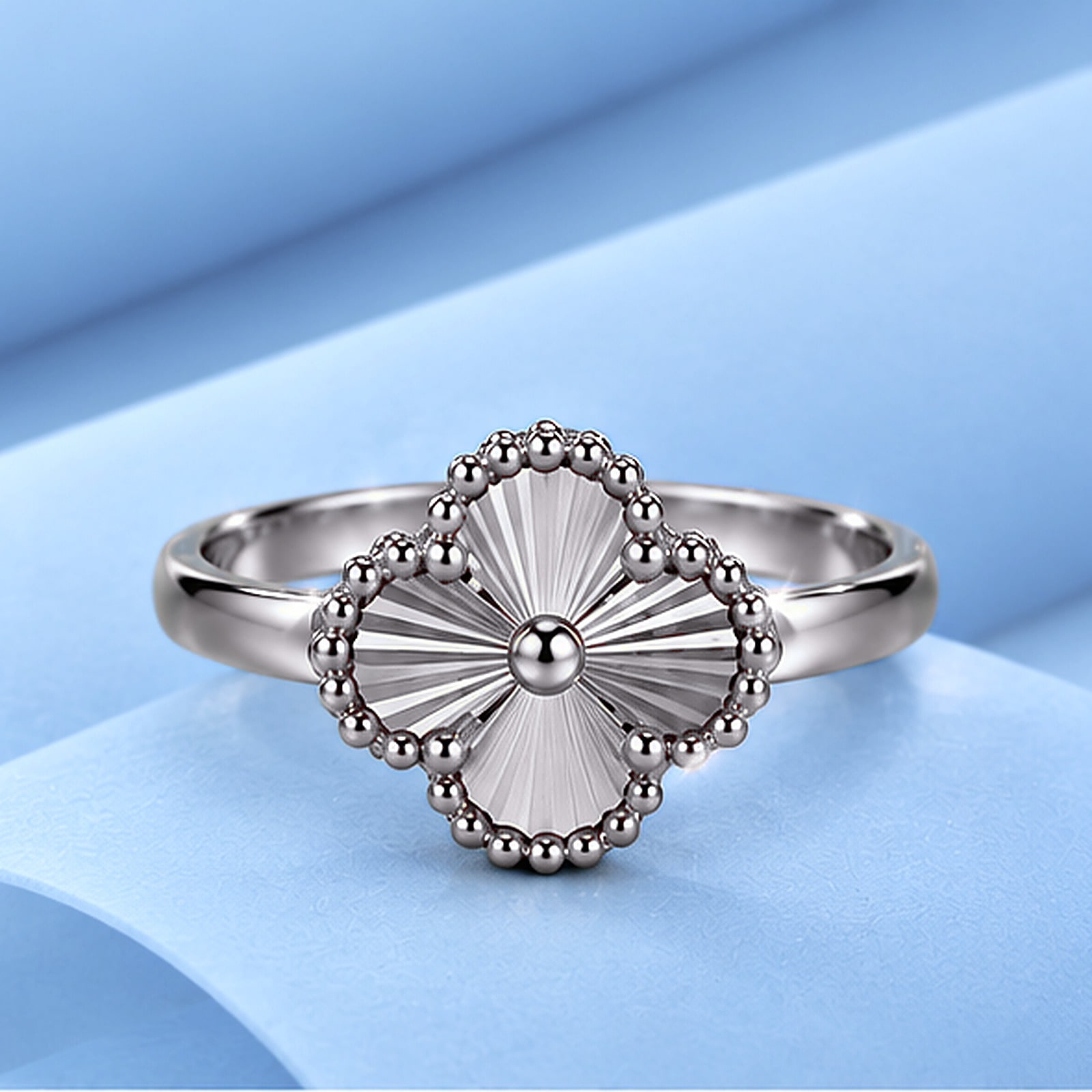 Gold ring in the style of van cleef