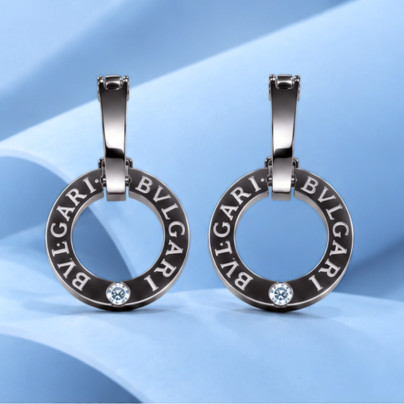 Gold earrings with diamonds in the style of bulgari