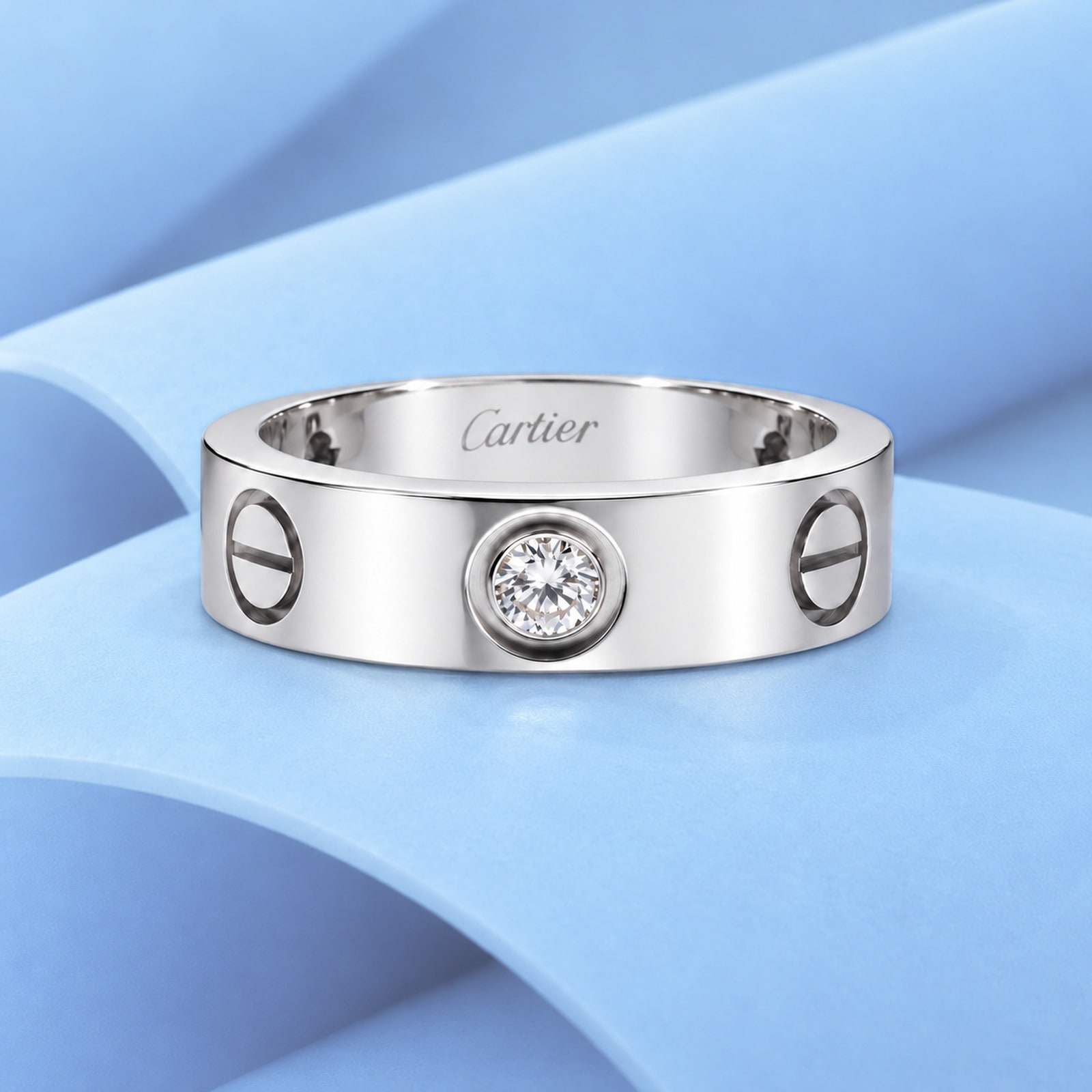 Gold ring with diamonds in the style of cartier