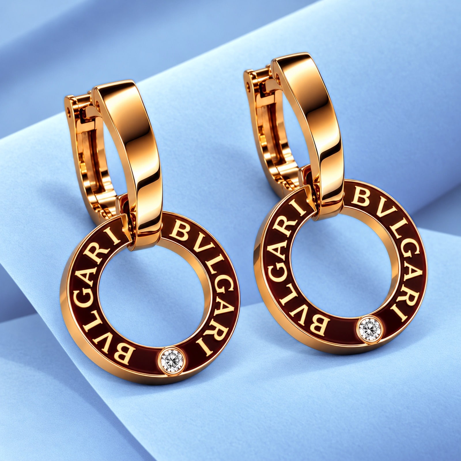 Gold earrings with diamonds in the style of bulgari