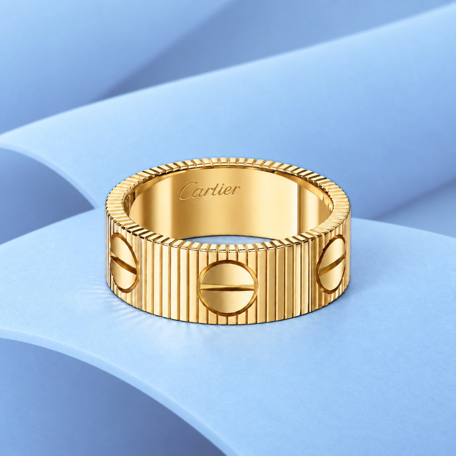 Gold ring in the style of cartier
