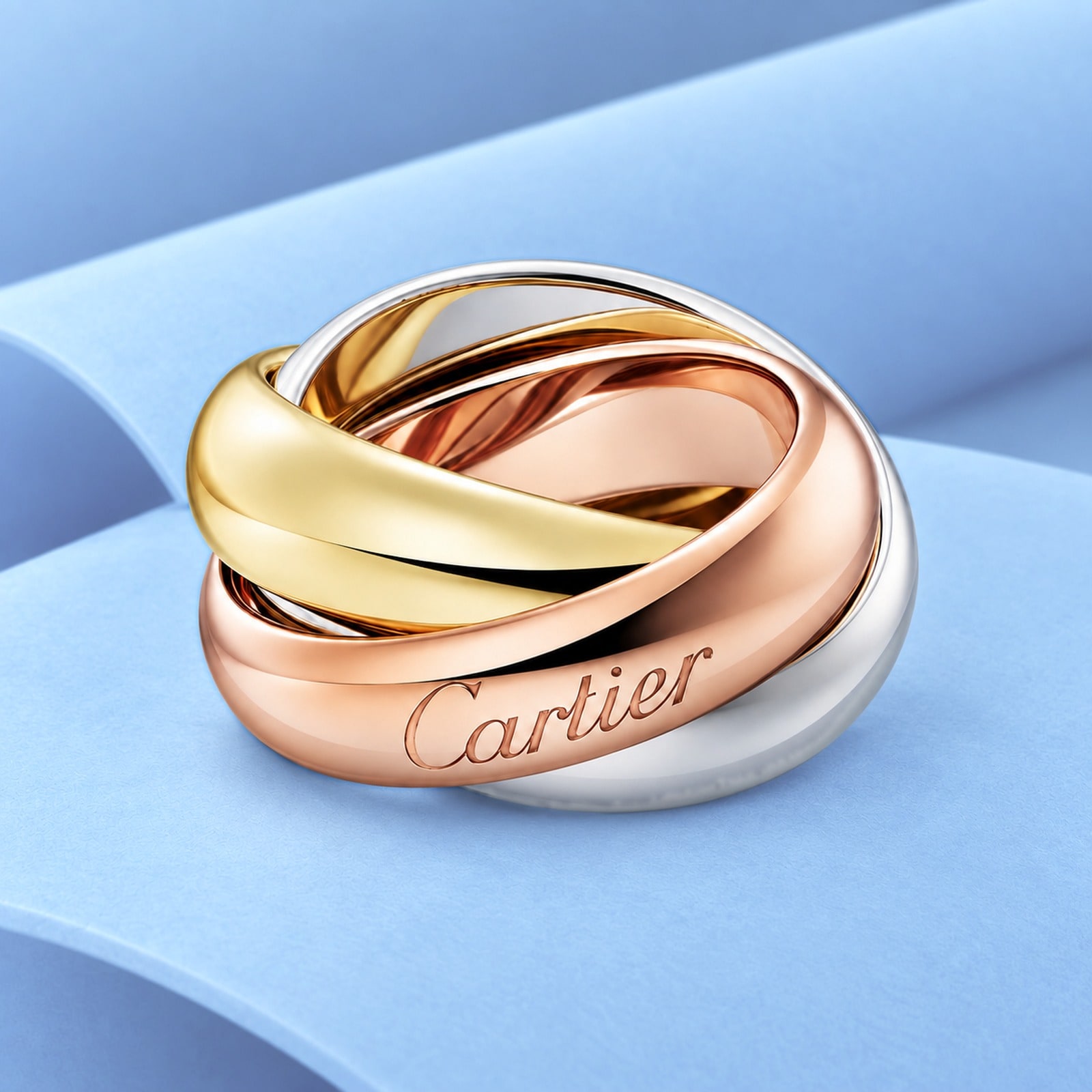 Tri-gold ring in the style of cartier