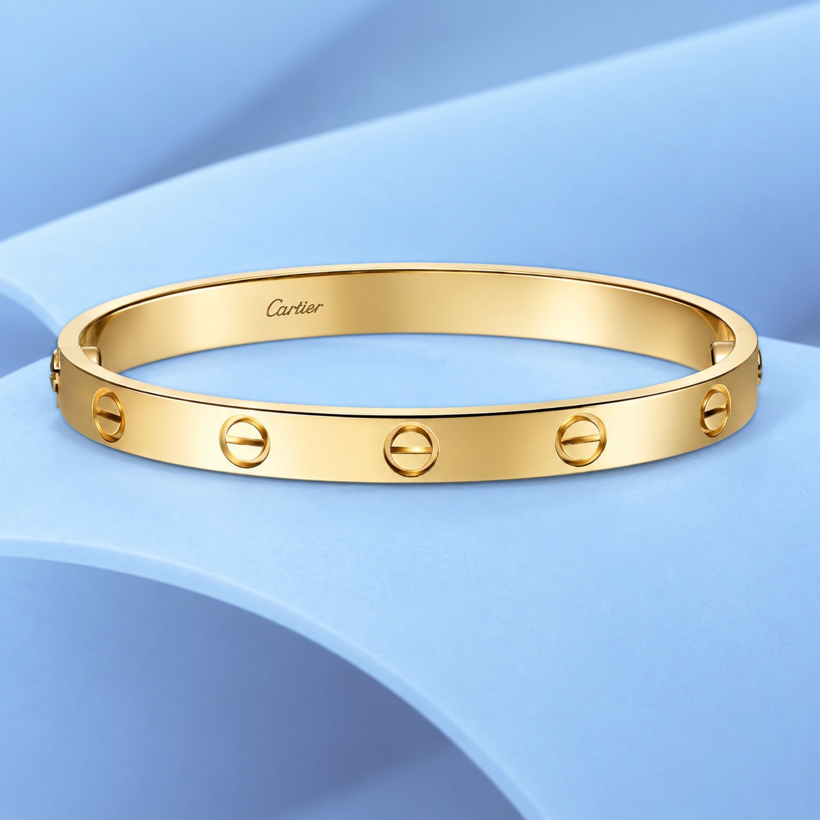 Gold bracelet in the style of cartier