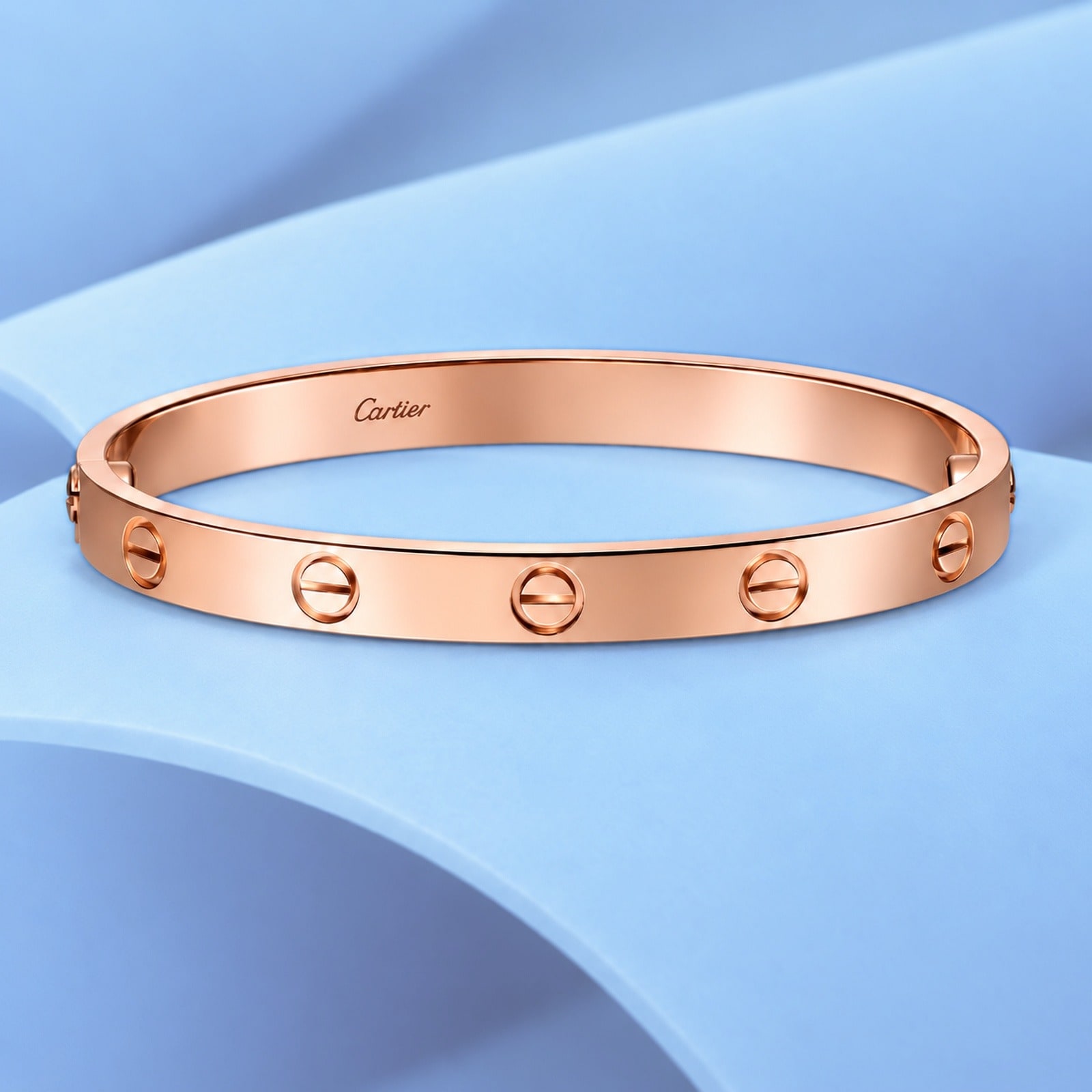 Gold bracelet in the style of cartier