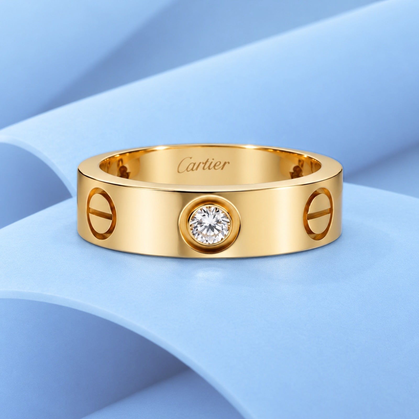 Gold ring with diamonds in the style of cartier